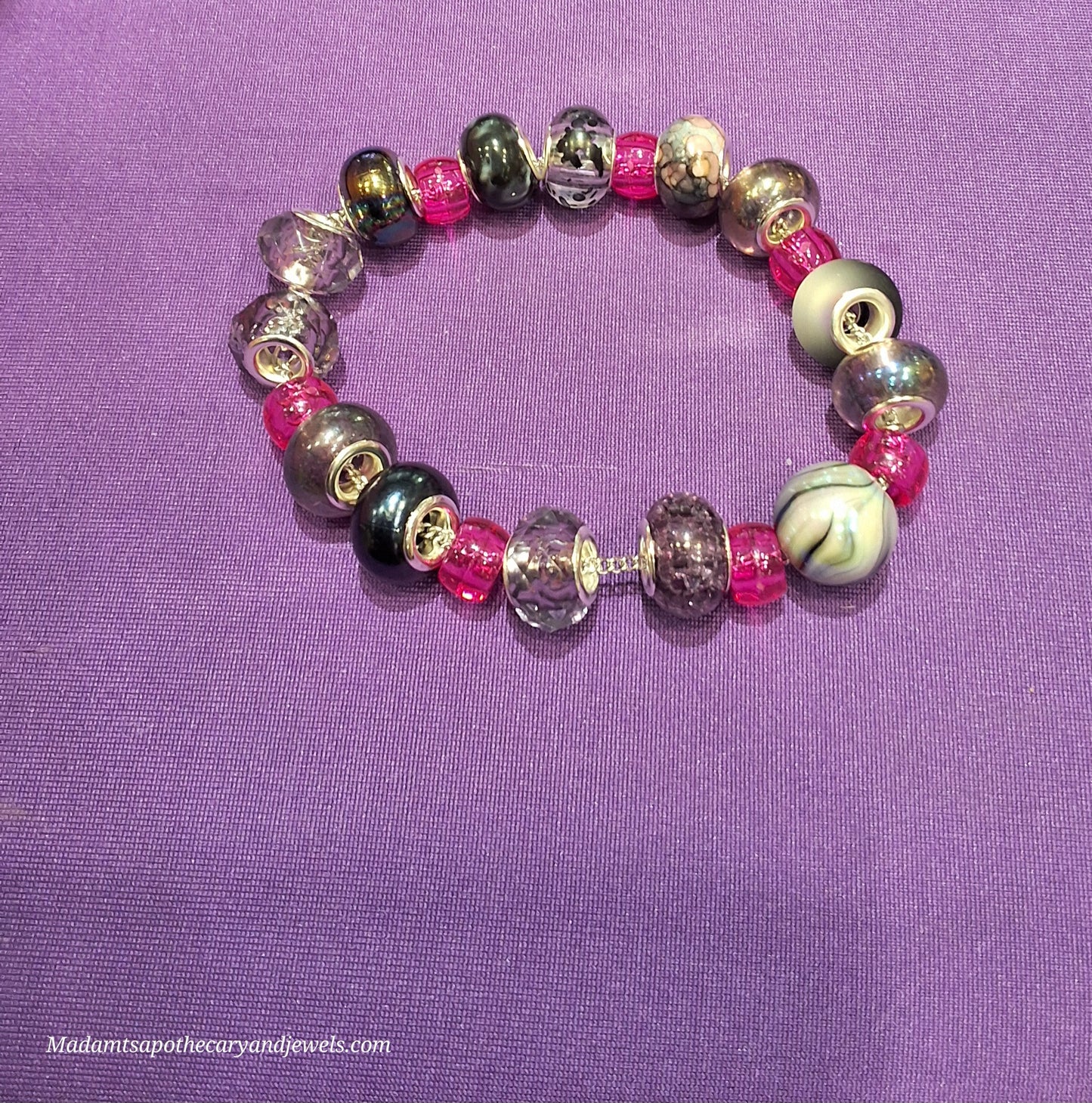 Purple bracelet on wrist - colorful jewelry accessory